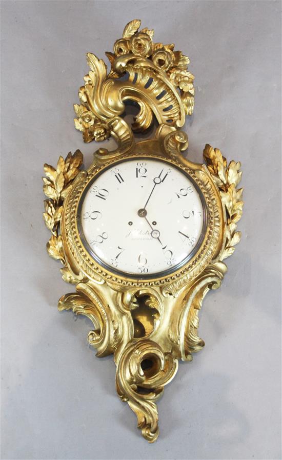 J Eckstrom of Stockholm. A Swedish carved giltwood cartel clock, height 36in.
